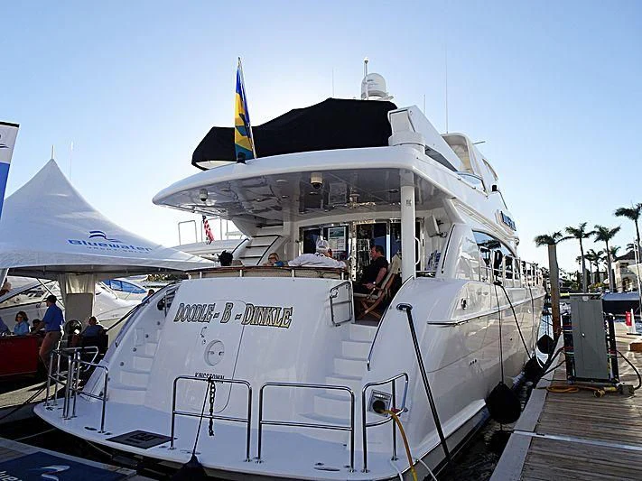 a boat with a flag on the front aboard ARETECTE Yacht for Sale