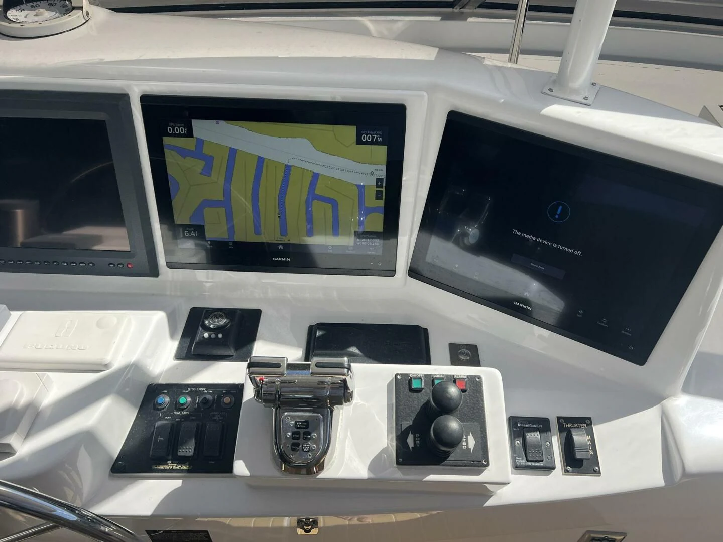 a console with a screen and buttons aboard ARETECTE Yacht for Sale