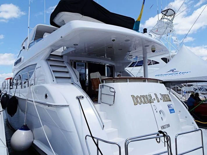 a boat with a canopy aboard ARETECTE Yacht for Sale