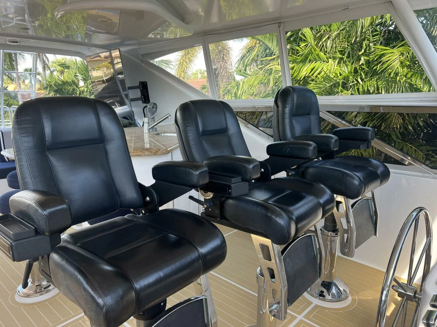 a room with chairs and a table aboard ARETECTE Yacht for Sale