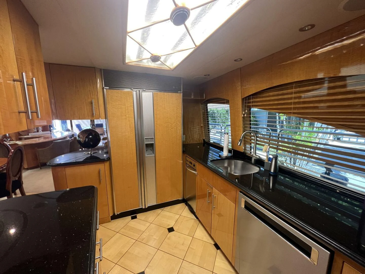 a kitchen with a sink and a stove aboard ARETECTE Yacht for Sale
