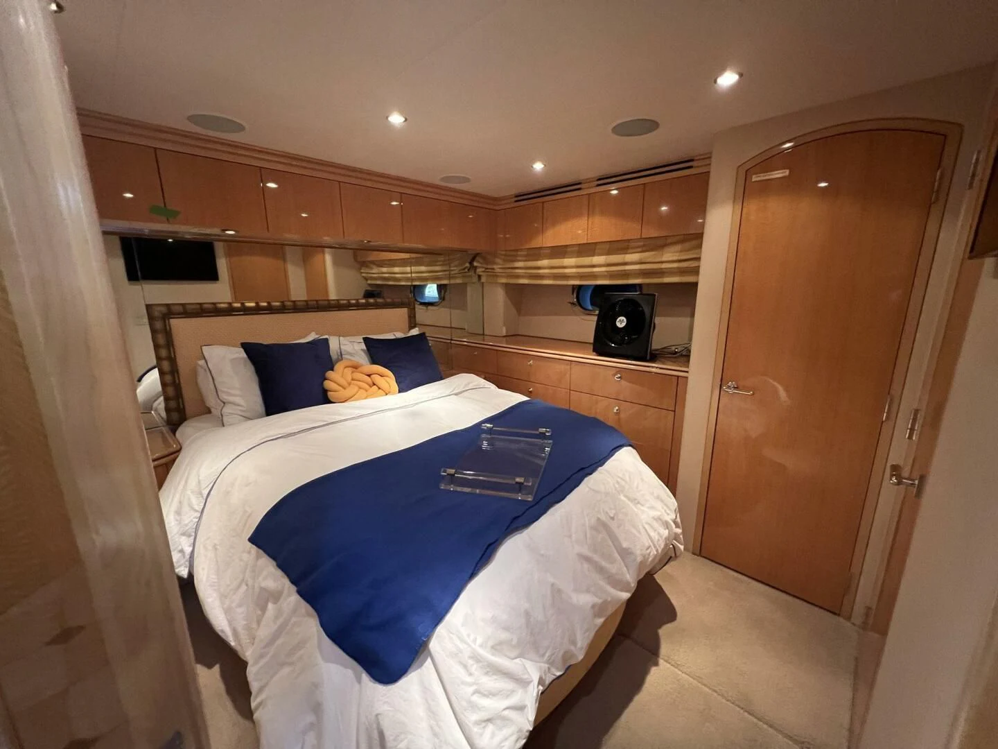 a room with a bed and a television aboard ARETECTE Yacht for Sale