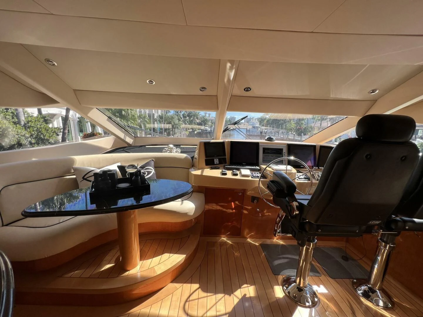a table and chairs in a room aboard ARETECTE Yacht for Sale