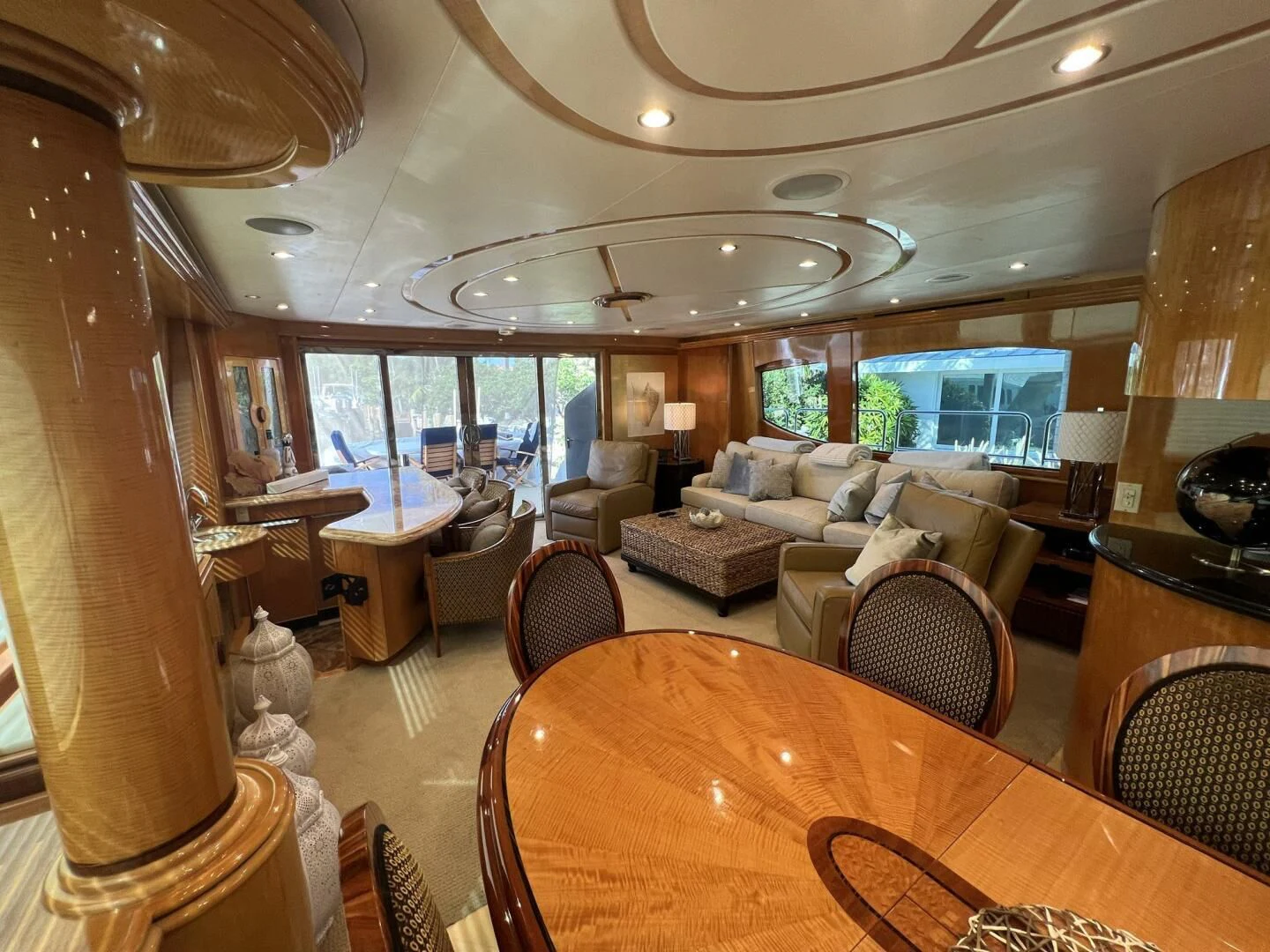 a living room with a large window aboard ARETECTE Yacht for Sale