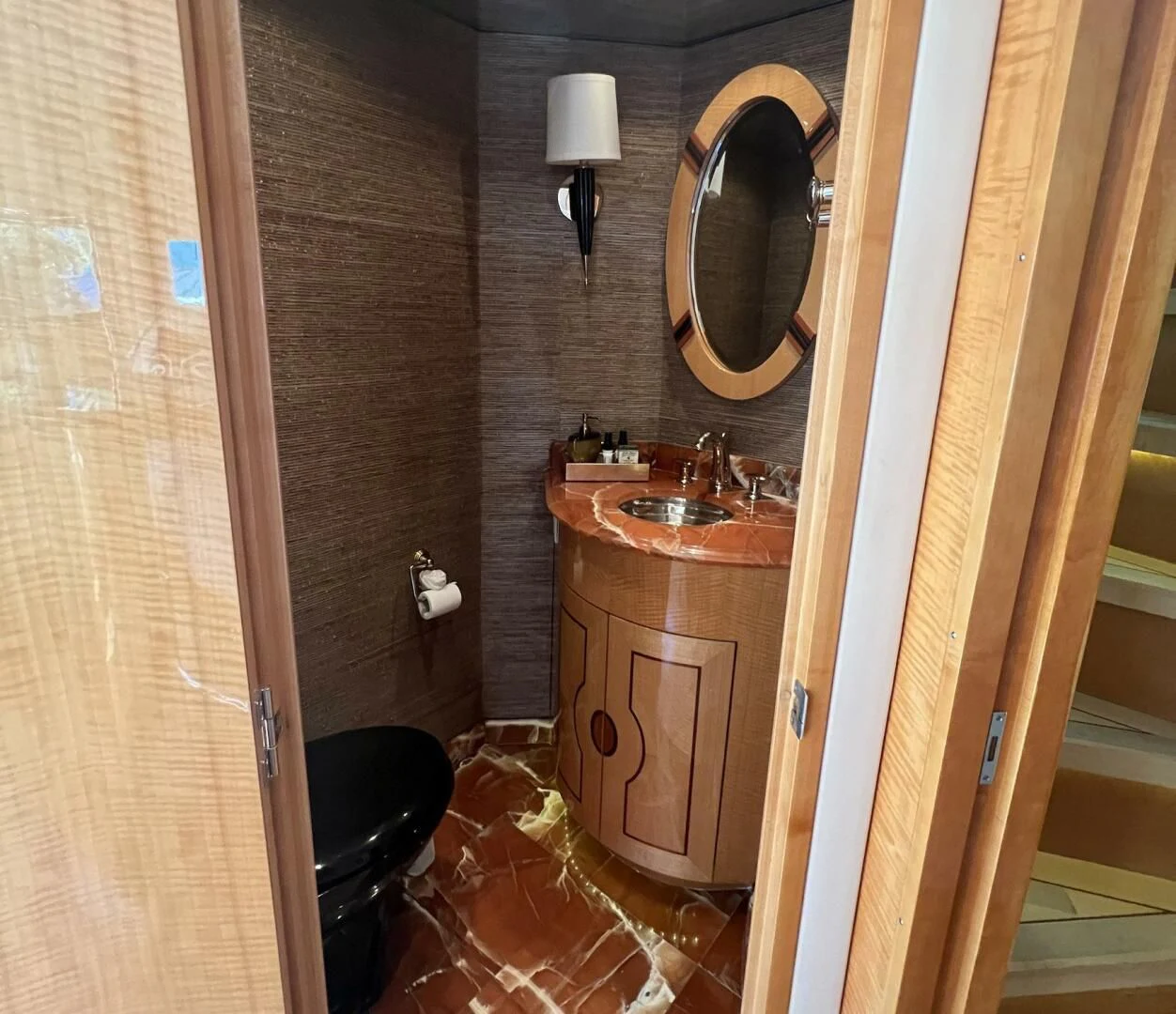a bathroom with a sink and a mirror aboard ARETECTE Yacht for Sale