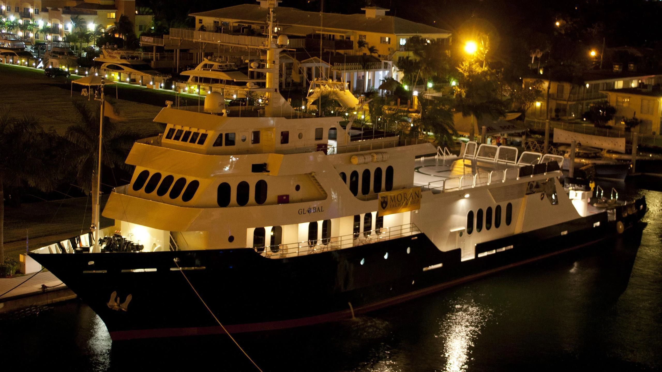 a couple of boats on a river aboard GLOBAL Yacht for Sale