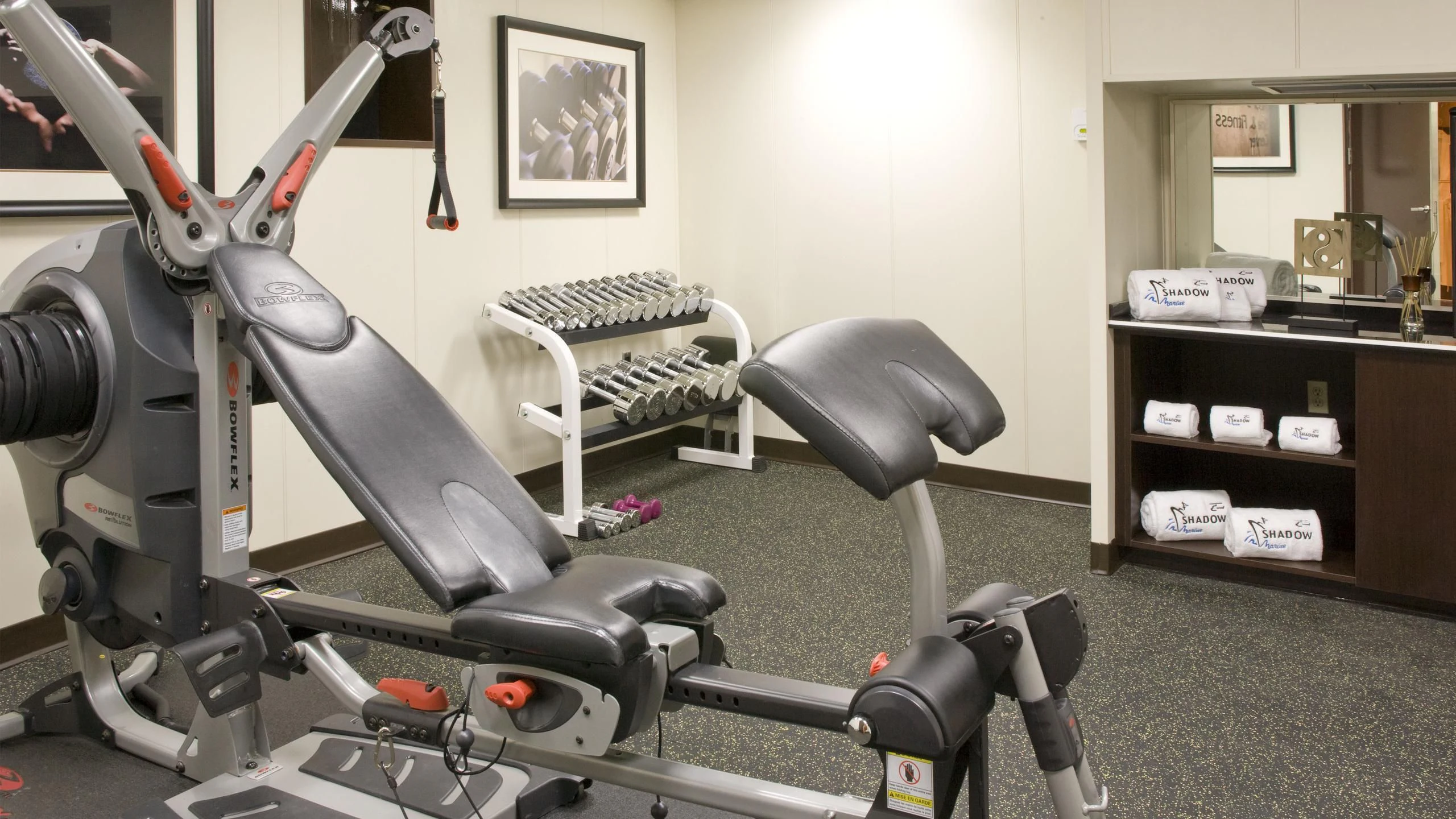 a gym with exercise equipment aboard GLOBAL Yacht for Sale