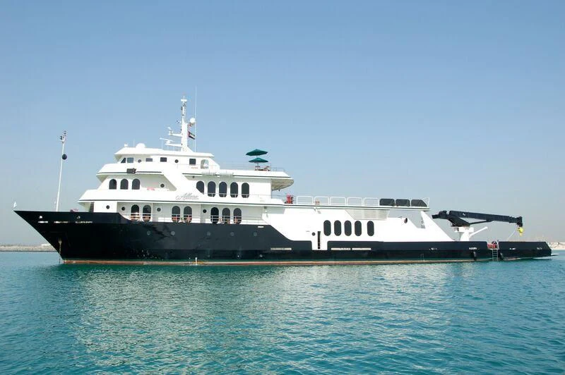 a large ship in the water aboard GLOBAL Yacht for Sale