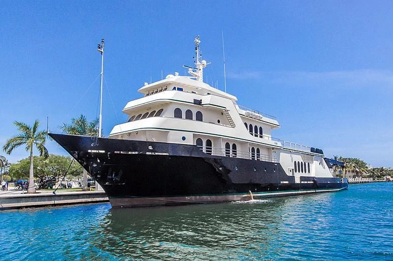 a large white boat aboard GLOBAL Yacht for Sale