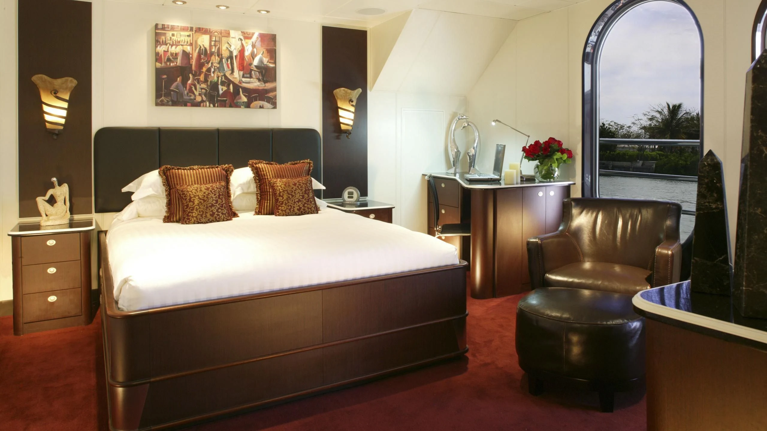 a bed in a room aboard GLOBAL Yacht for Sale