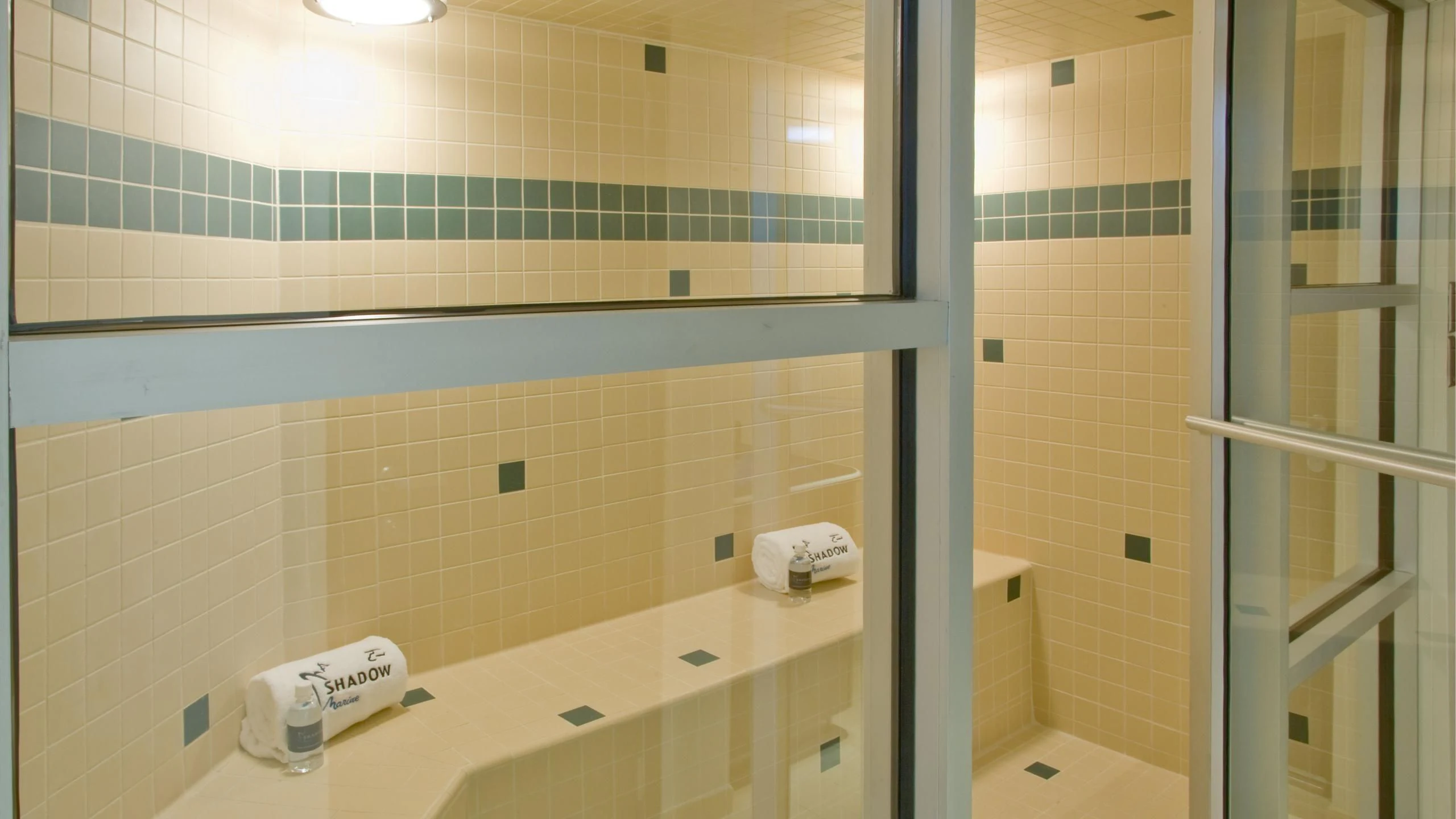 a bathroom with a countertop sink and mirror aboard GLOBAL Yacht for Sale