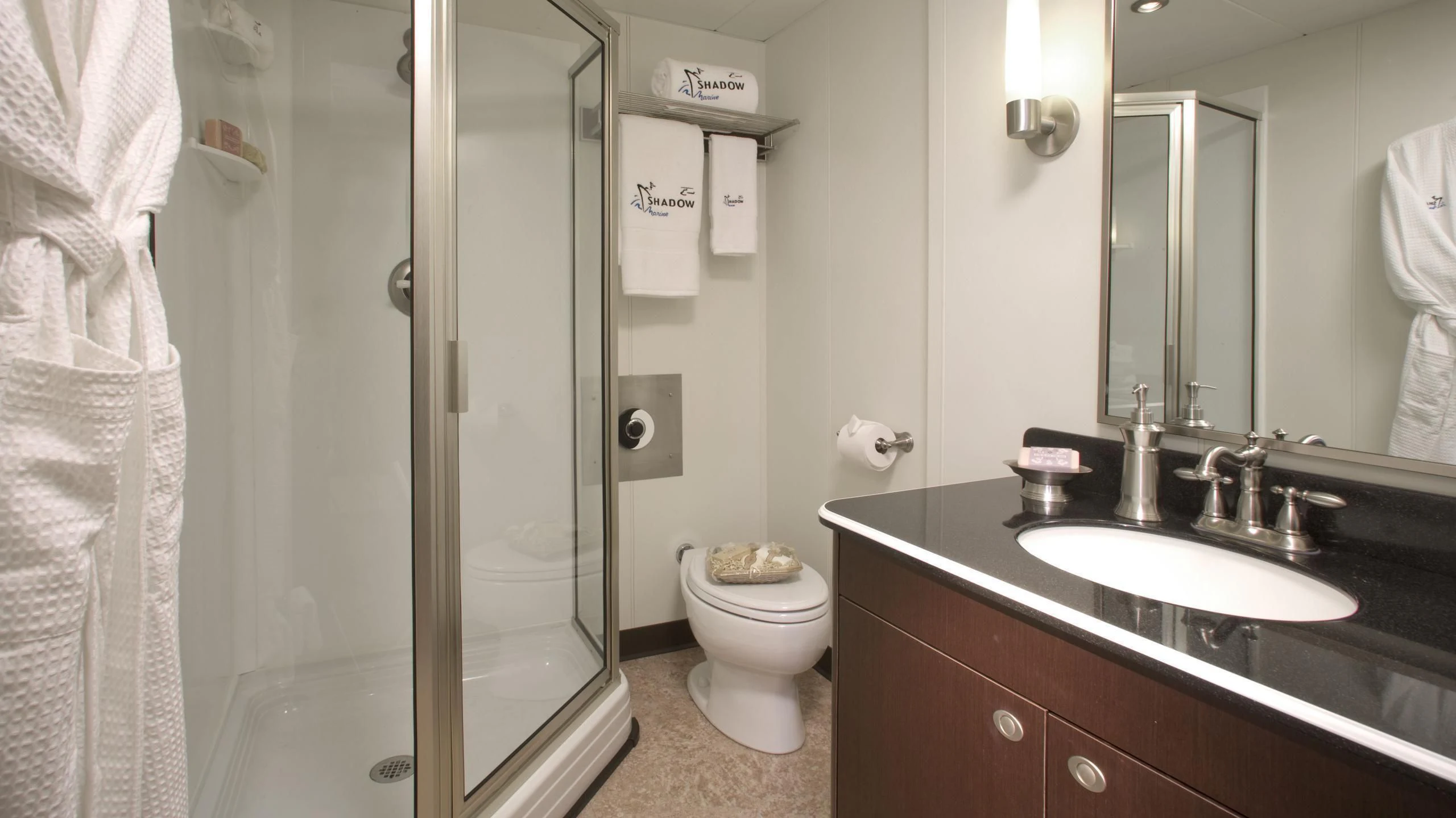 a bathroom with a sink and a toilet aboard GLOBAL Yacht for Sale