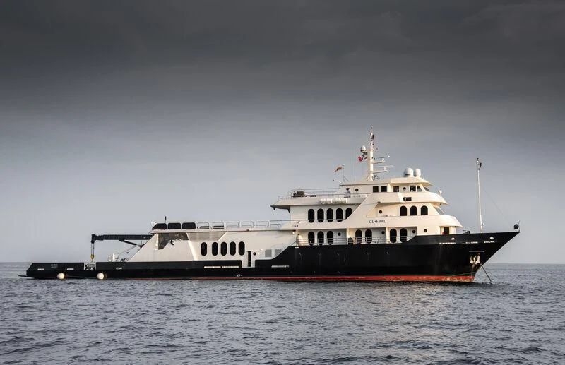 a large boat in the water aboard GLOBAL Yacht for Sale