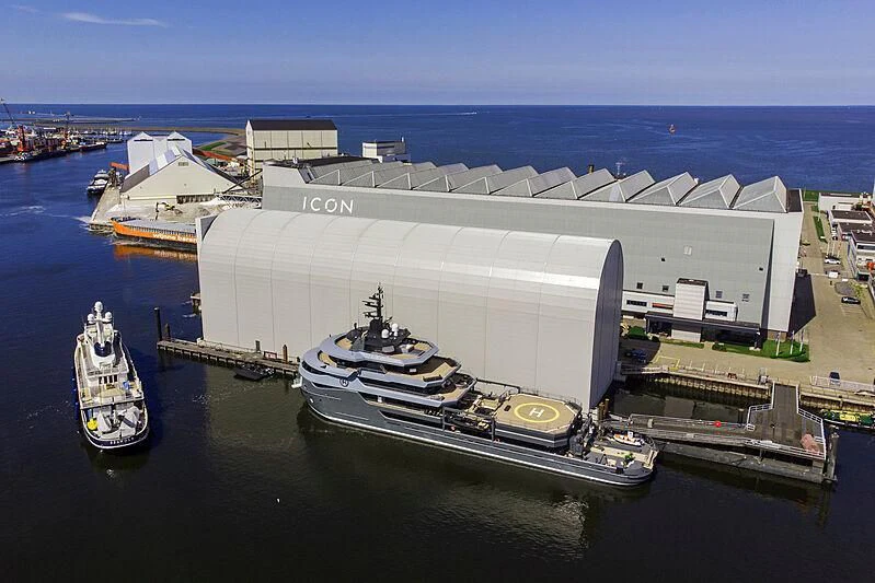 a large ship docked at a port aboard Q Yacht for Sale