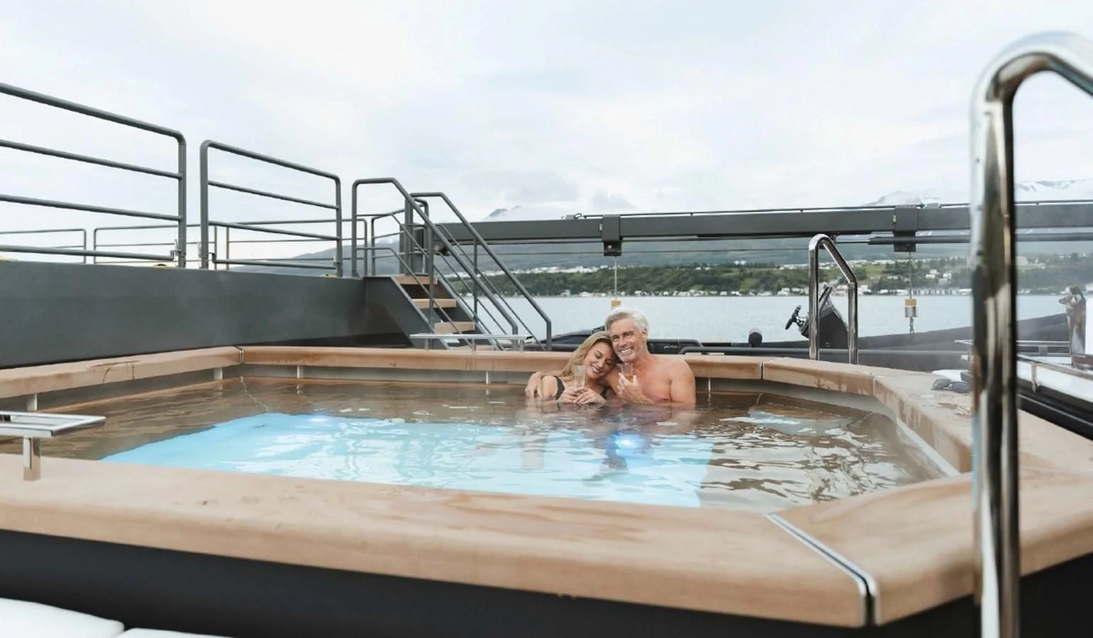 a person in a pool aboard Q Yacht for Sale