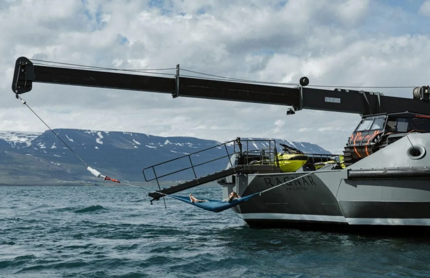 a helicopter flying over a boat aboard Q Yacht for Sale