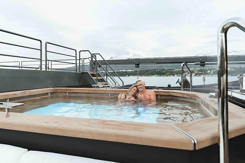 a person in a pool aboard Q Yacht for Sale