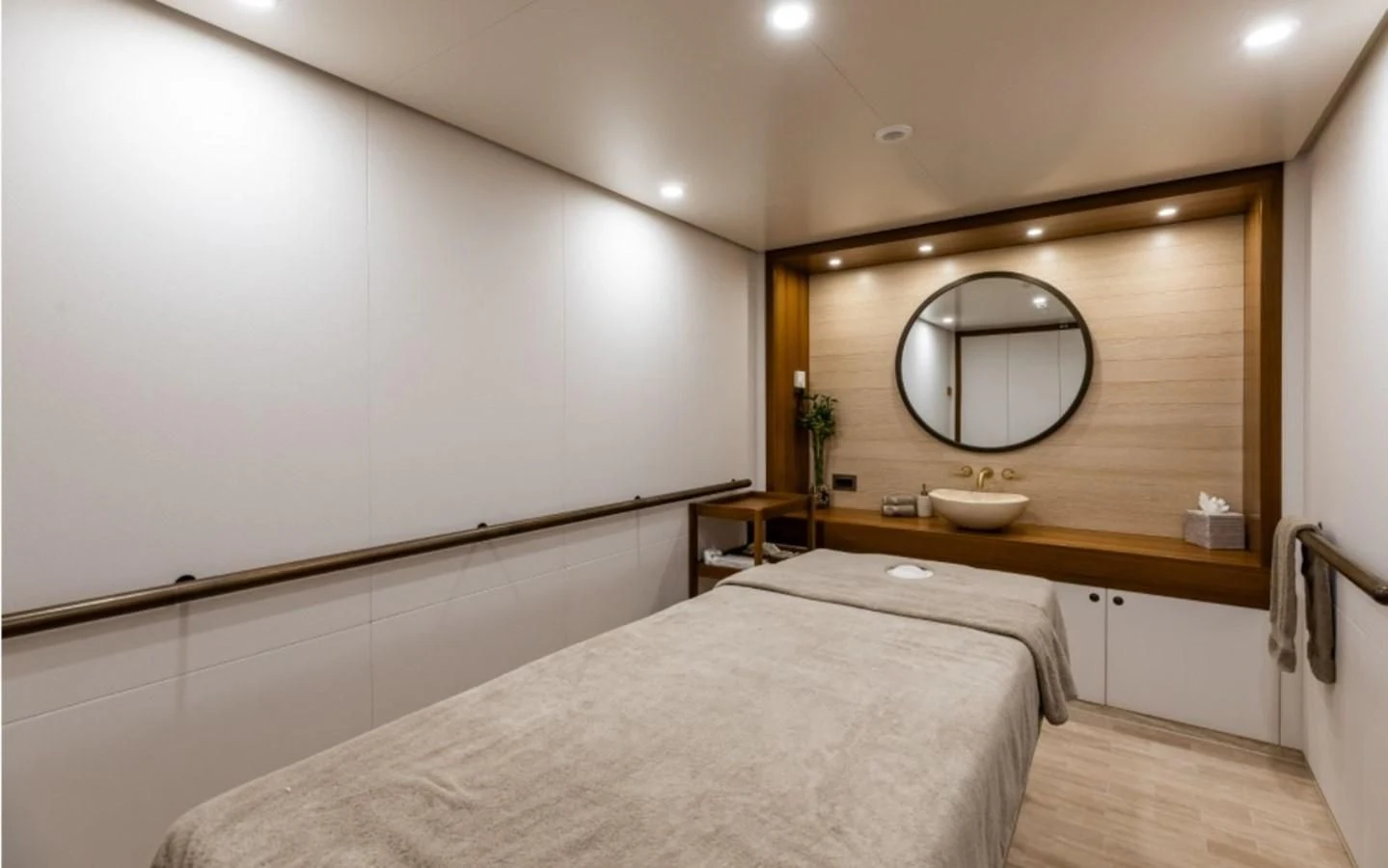 a bathroom with a large mirror aboard Q Yacht for Sale