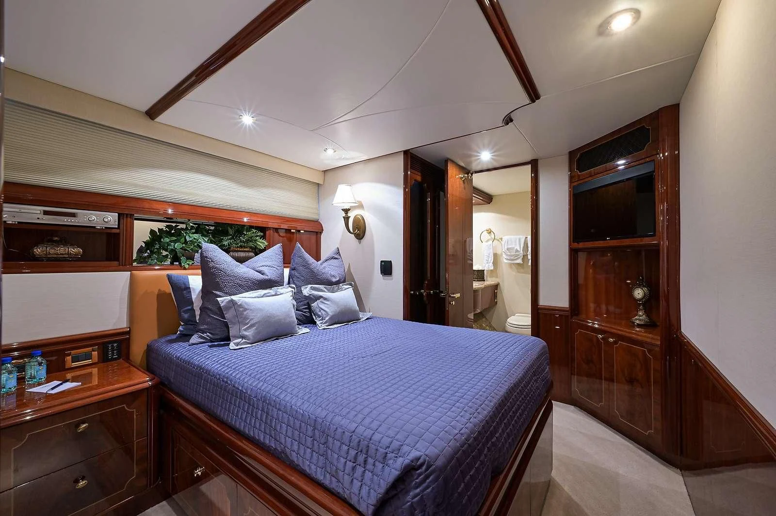 a bed in a room aboard LADY KRISTINA Yacht for Sale
