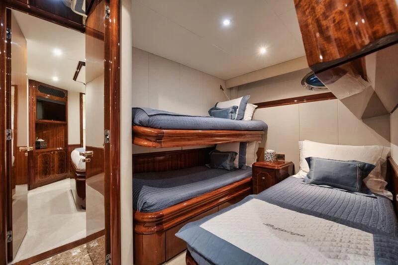 a couple of beds in a room aboard LADY KRISTINA Yacht for Sale
