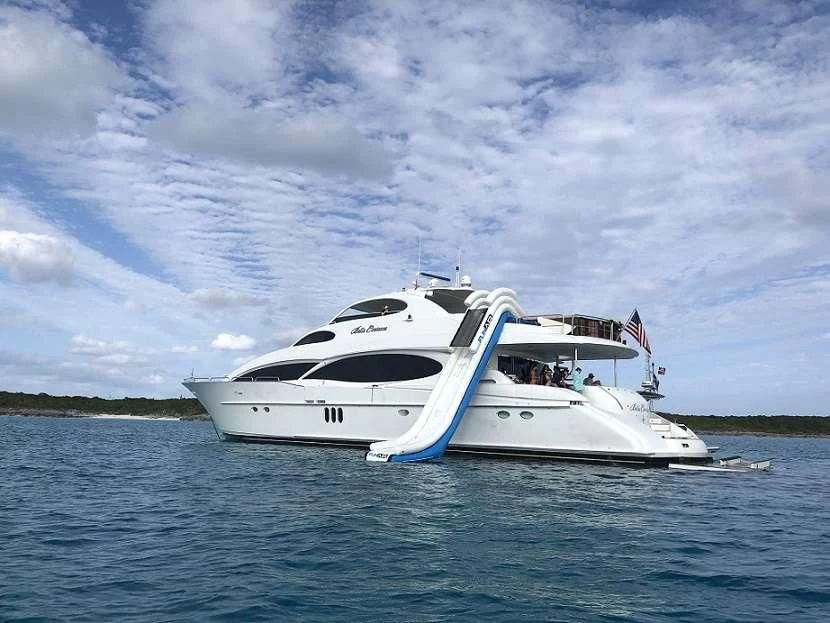 a white boat on the water aboard LADY KRISTINA Yacht for Sale