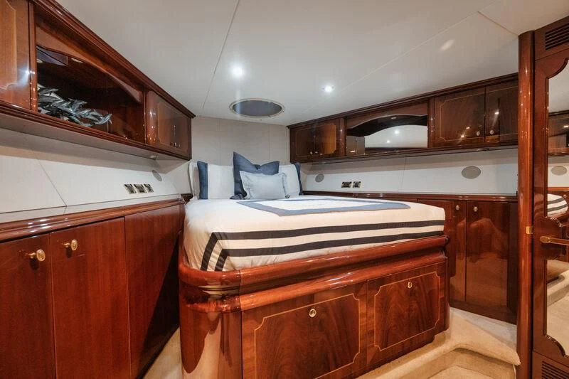 a bed in a room aboard LADY KRISTINA Yacht for Sale