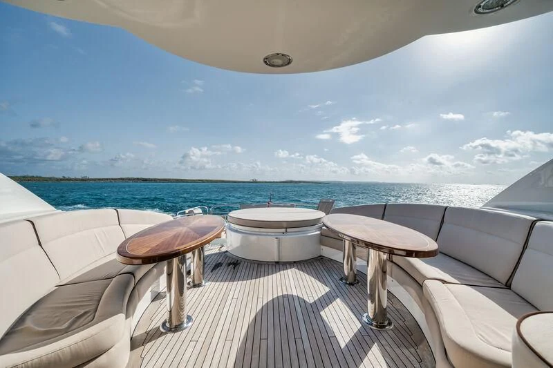 a room with a table and chairs on it aboard LADY KRISTINA Yacht for Sale