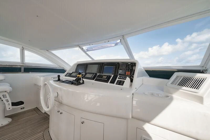 the inside of a white car aboard LADY KRISTINA Yacht for Sale