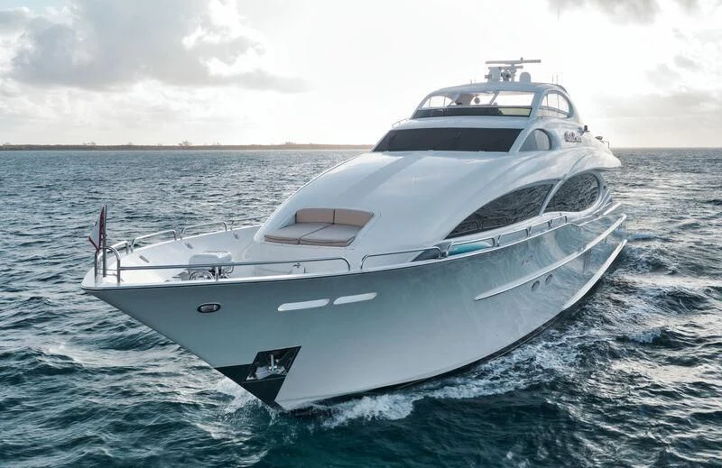 a white yacht in the water aboard LADY KRISTINA Yacht for Sale