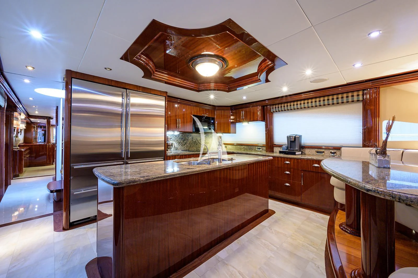 a kitchen with a large island aboard LADY KRISTINA Yacht for Sale