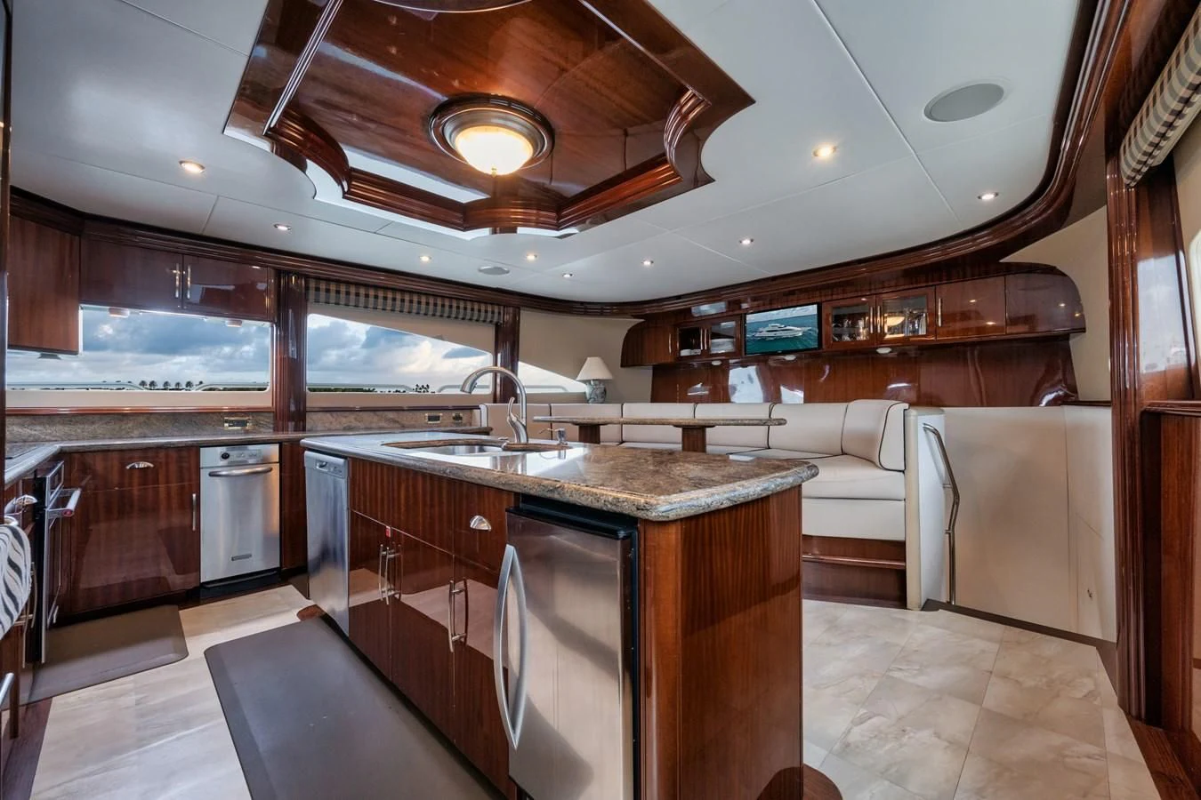 a kitchen with a large island aboard LADY KRISTINA Yacht for Sale