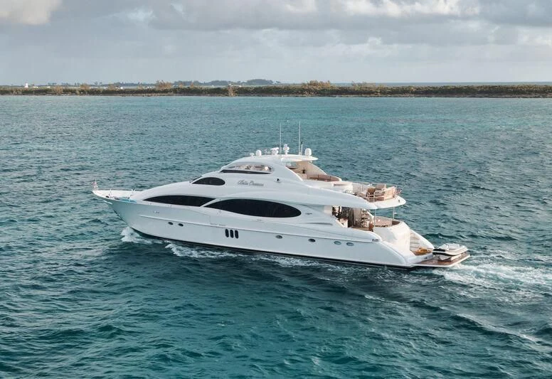 a white yacht in the water aboard LADY KRISTINA Yacht for Sale
