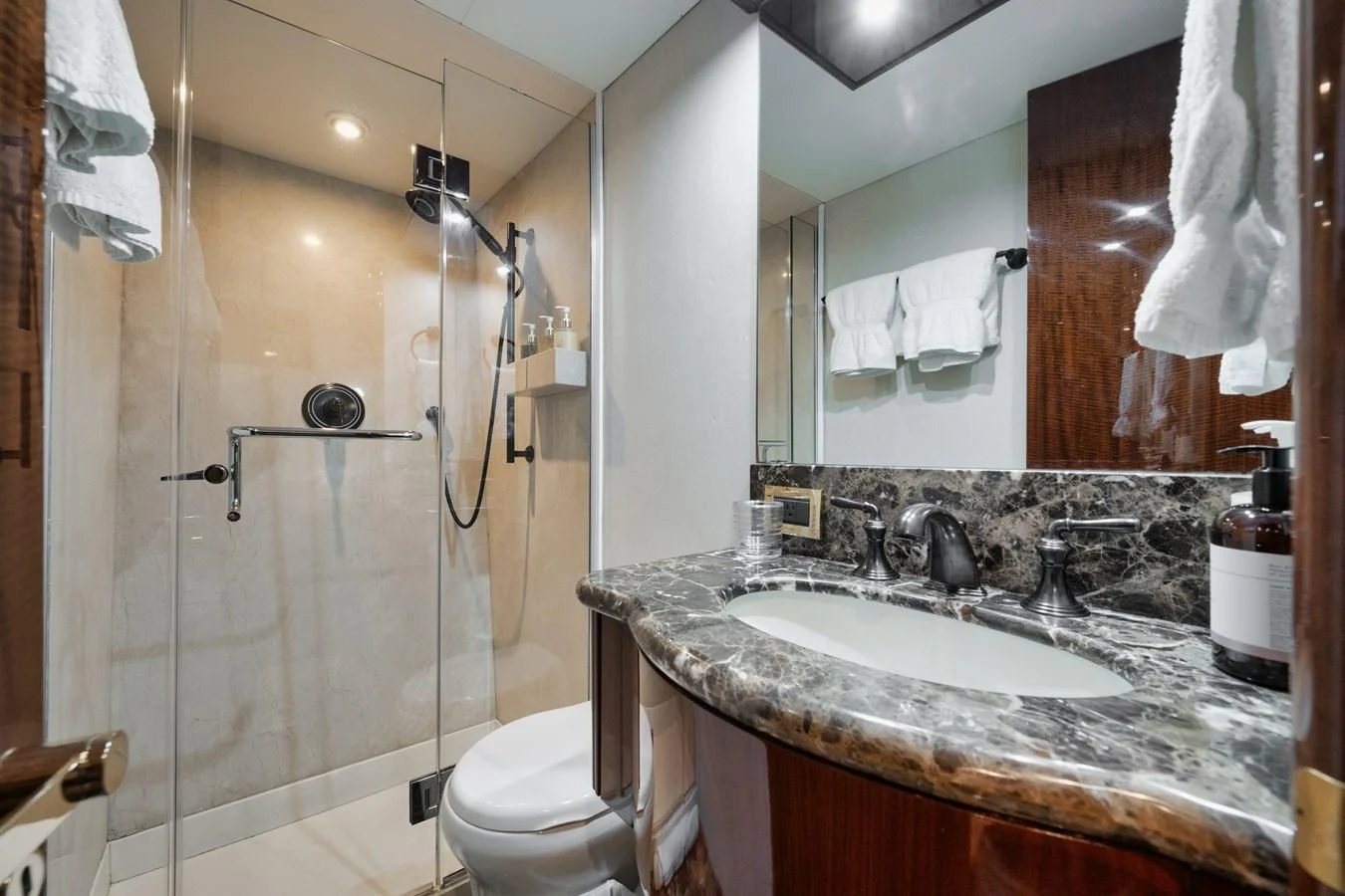 a bathroom with a sink and a toilet aboard LADY KRISTINA Yacht for Sale