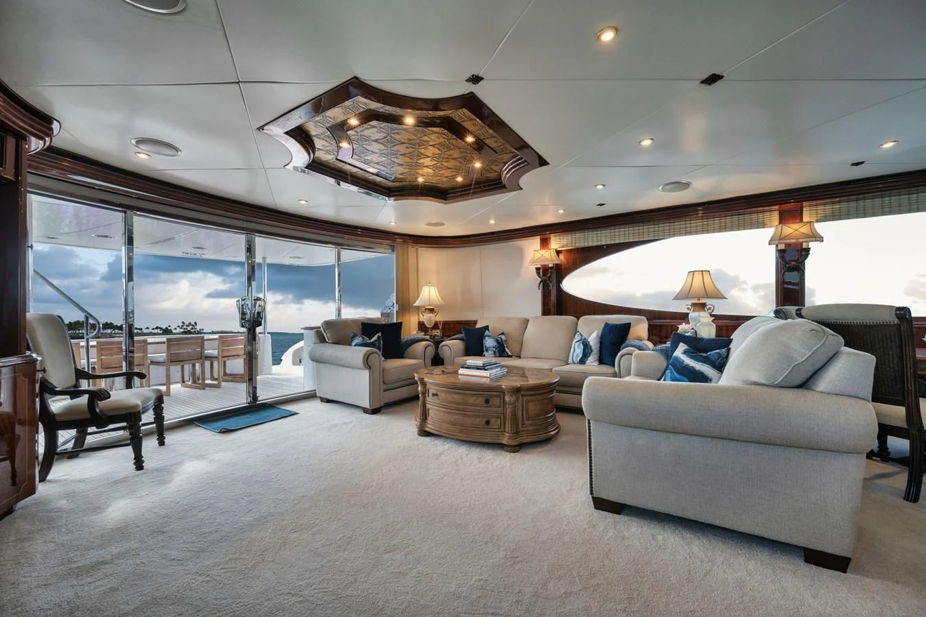a living room with a large open window aboard LADY KRISTINA Yacht for Sale