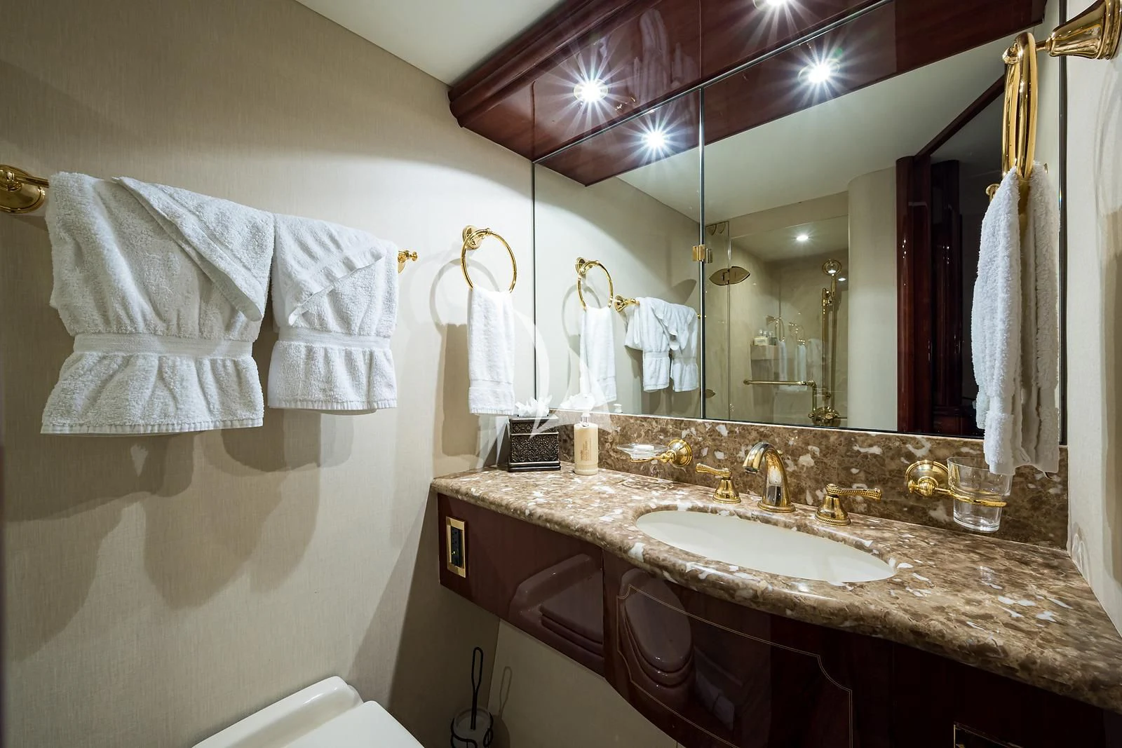 a bathroom with a large mirror aboard LADY KRISTINA Yacht for Sale