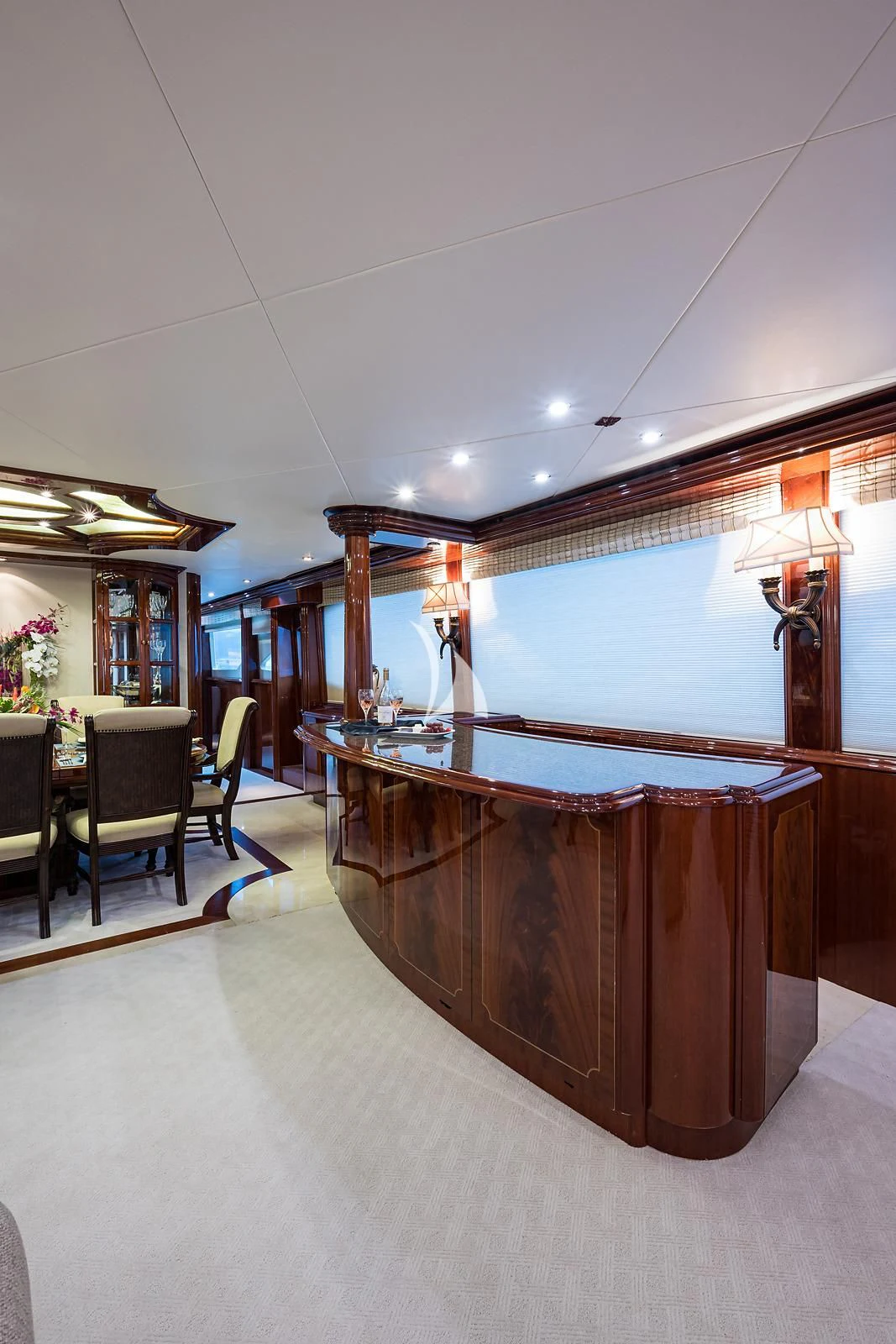 a bar with a table and chairs aboard LADY KRISTINA Yacht for Sale
