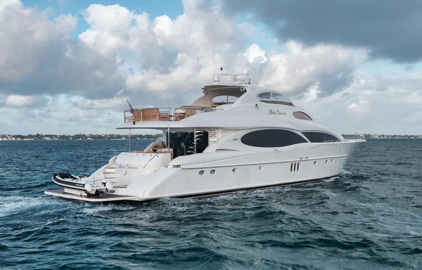 a white yacht in the water aboard LADY KRISTINA Yacht for Sale