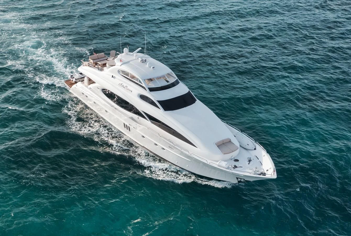 a white yacht in the water aboard LADY KRISTINA Yacht for Sale