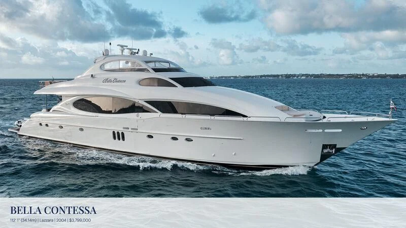 a white yacht in the water aboard LADY KRISTINA Yacht for Sale