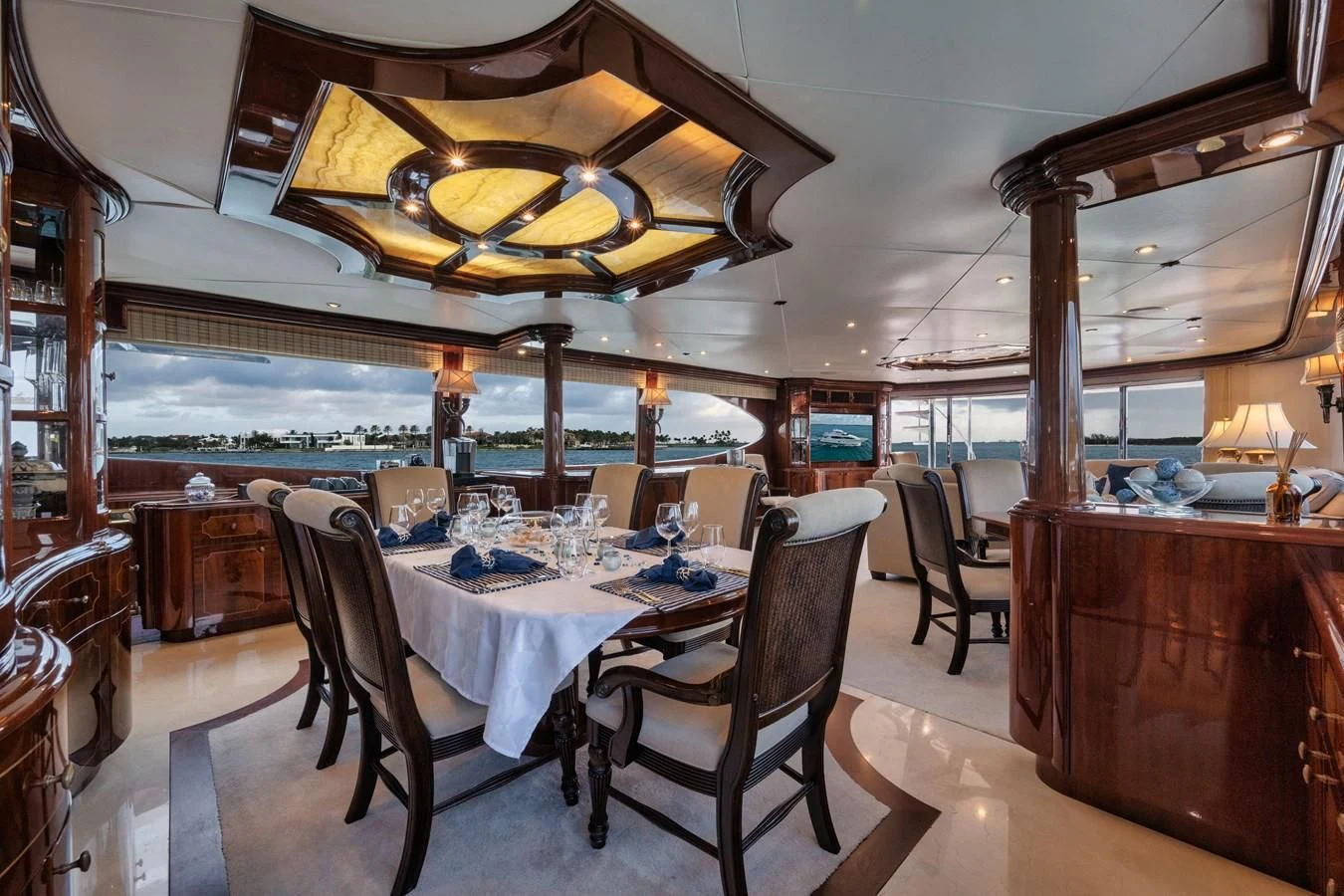 a dining room with a table and chairs aboard LADY KRISTINA Yacht for Sale
