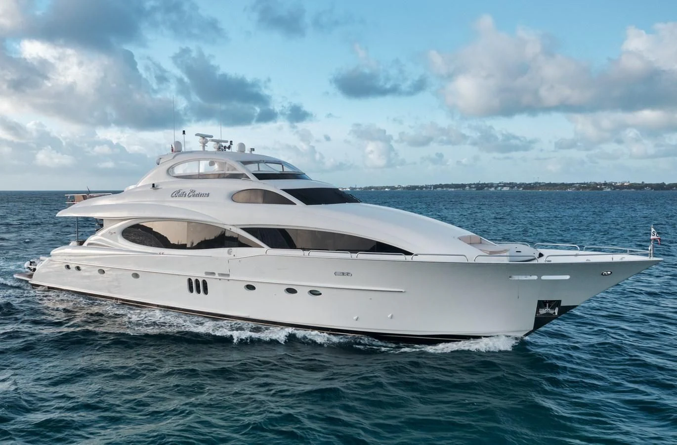 a white yacht in the water aboard LADY KRISTINA Yacht for Sale