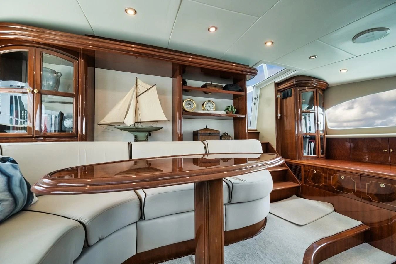 a room with a couch and a table aboard LADY KRISTINA Yacht for Sale