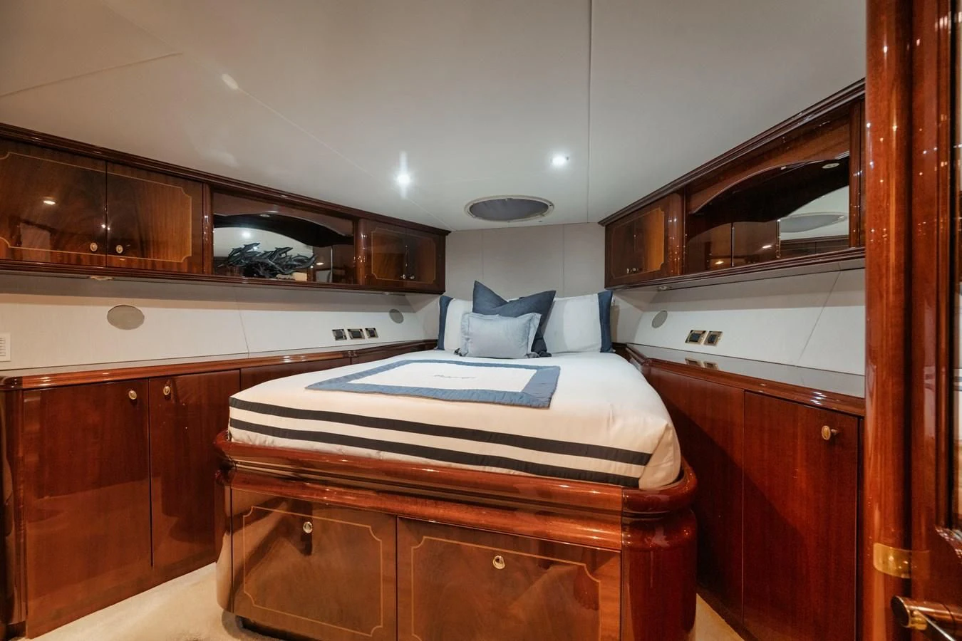a bedroom with a bed aboard LADY KRISTINA Yacht for Sale