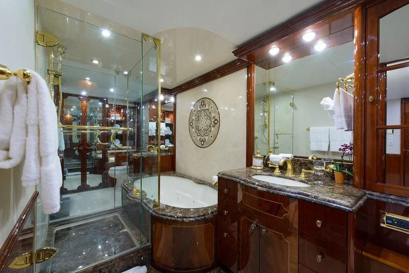 a bathroom with a large mirror aboard LADY KRISTINA Yacht for Sale