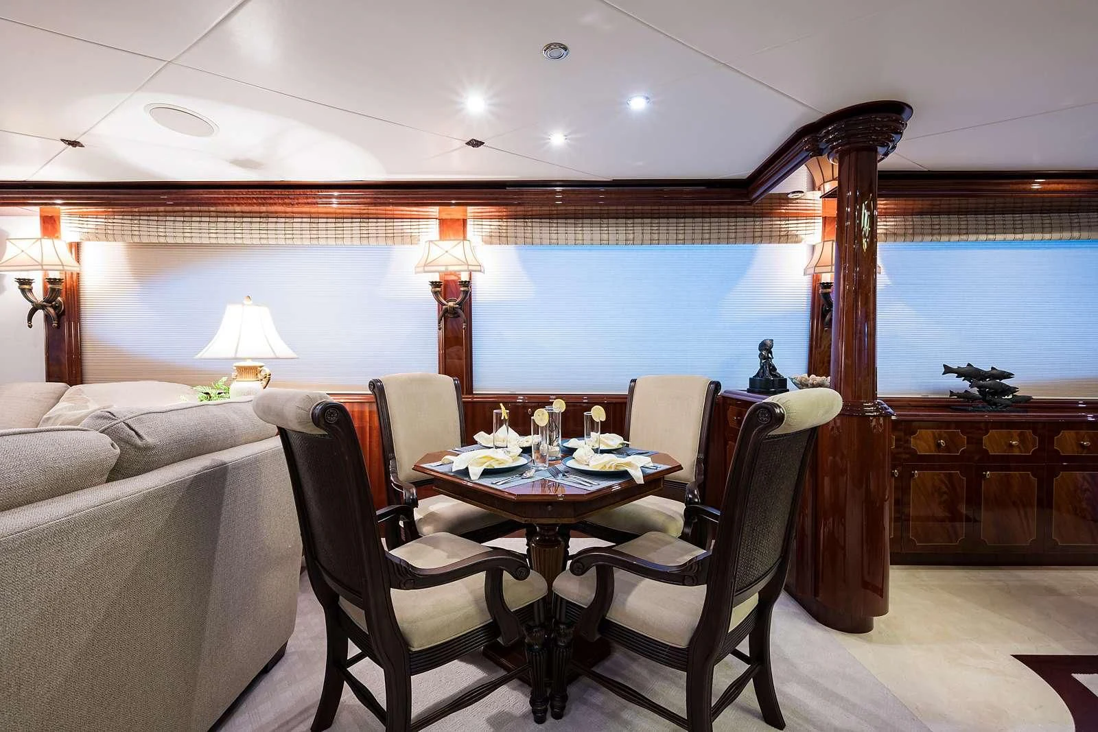 a room with a table and chairs aboard LADY KRISTINA Yacht for Sale