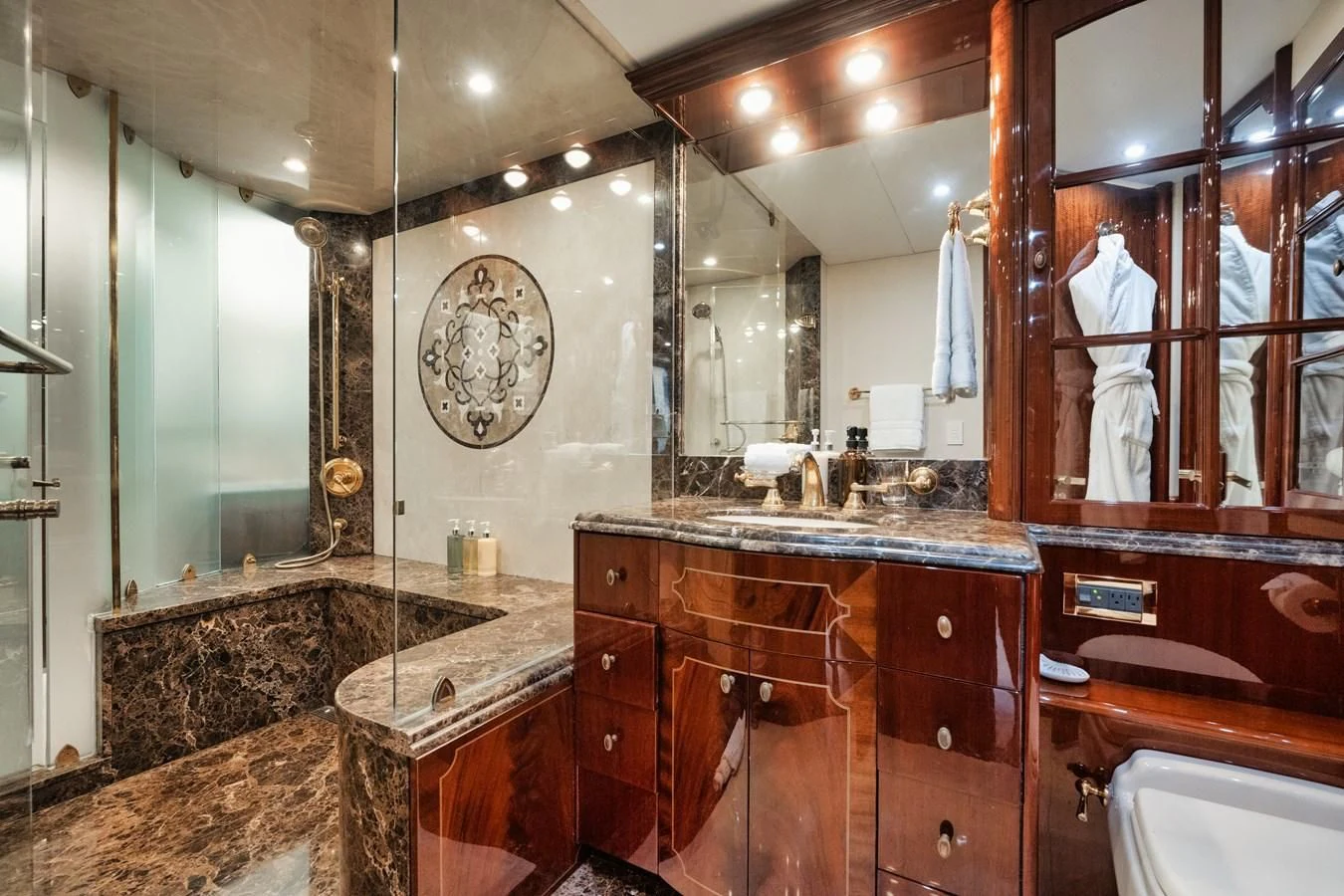 a bathroom with a marble countertop aboard LADY KRISTINA Yacht for Sale