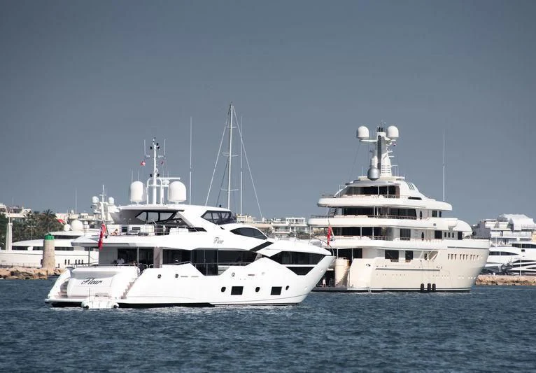 a group of boats in the water aboard FLEUR Yacht for Charter