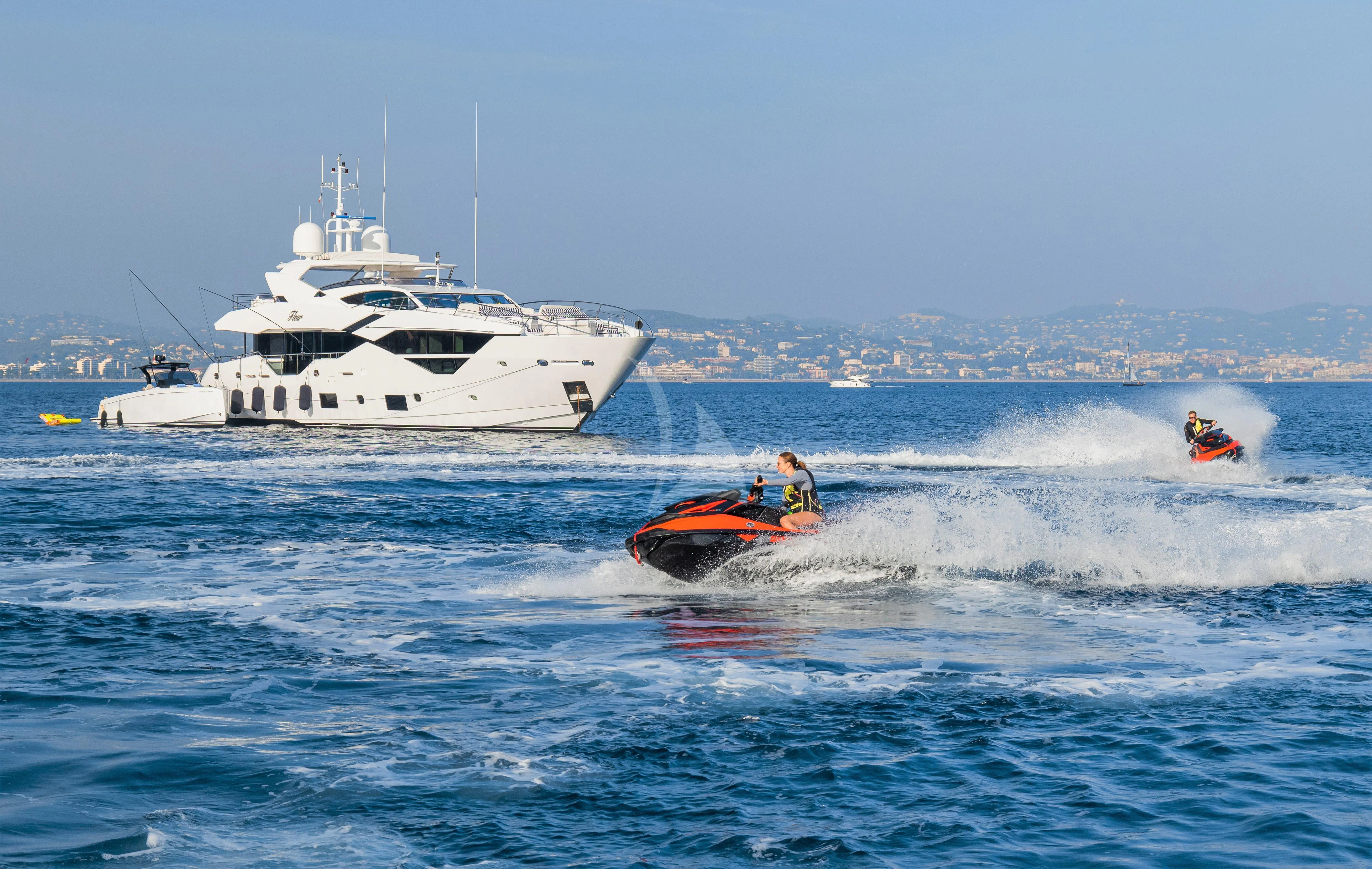 a boat and a boat in the water aboard FLEUR Yacht for Charter