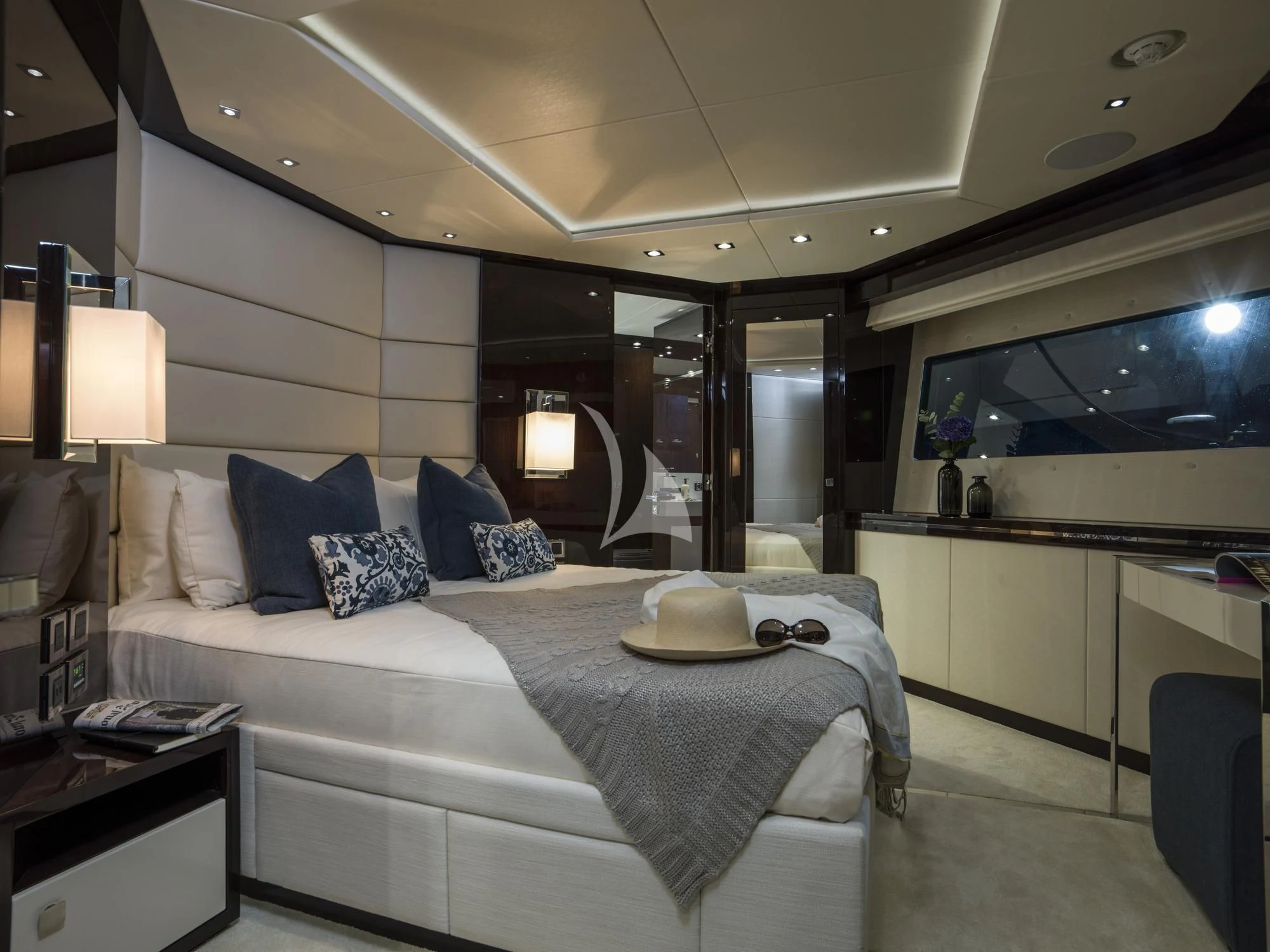 a hotel room with a bed aboard FLEUR Yacht for Charter