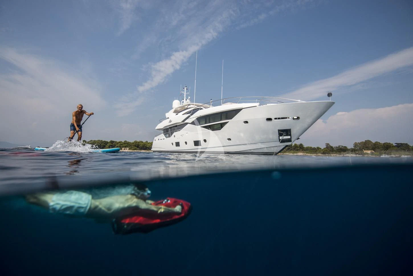 a person standing on a boat aboard FLEUR Yacht for Charter